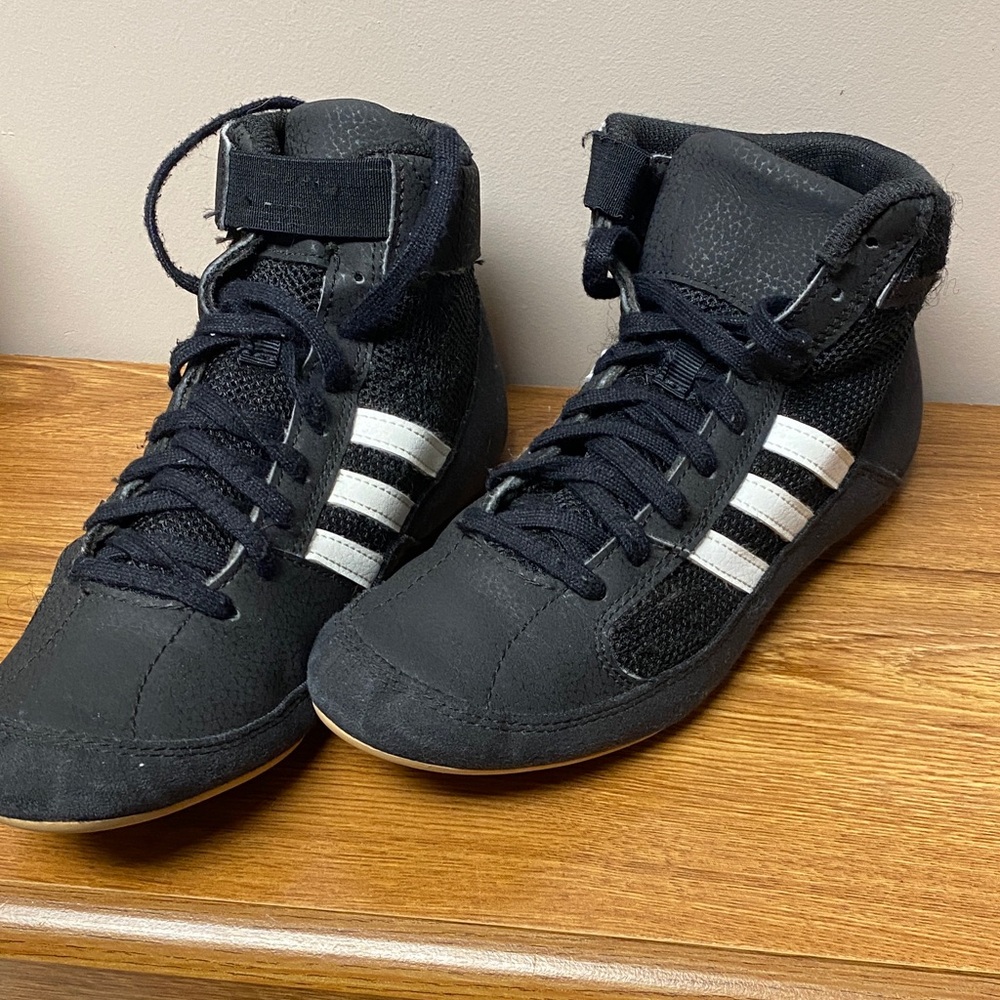 adidas unisex Black and White High-Top Athletic Shoes